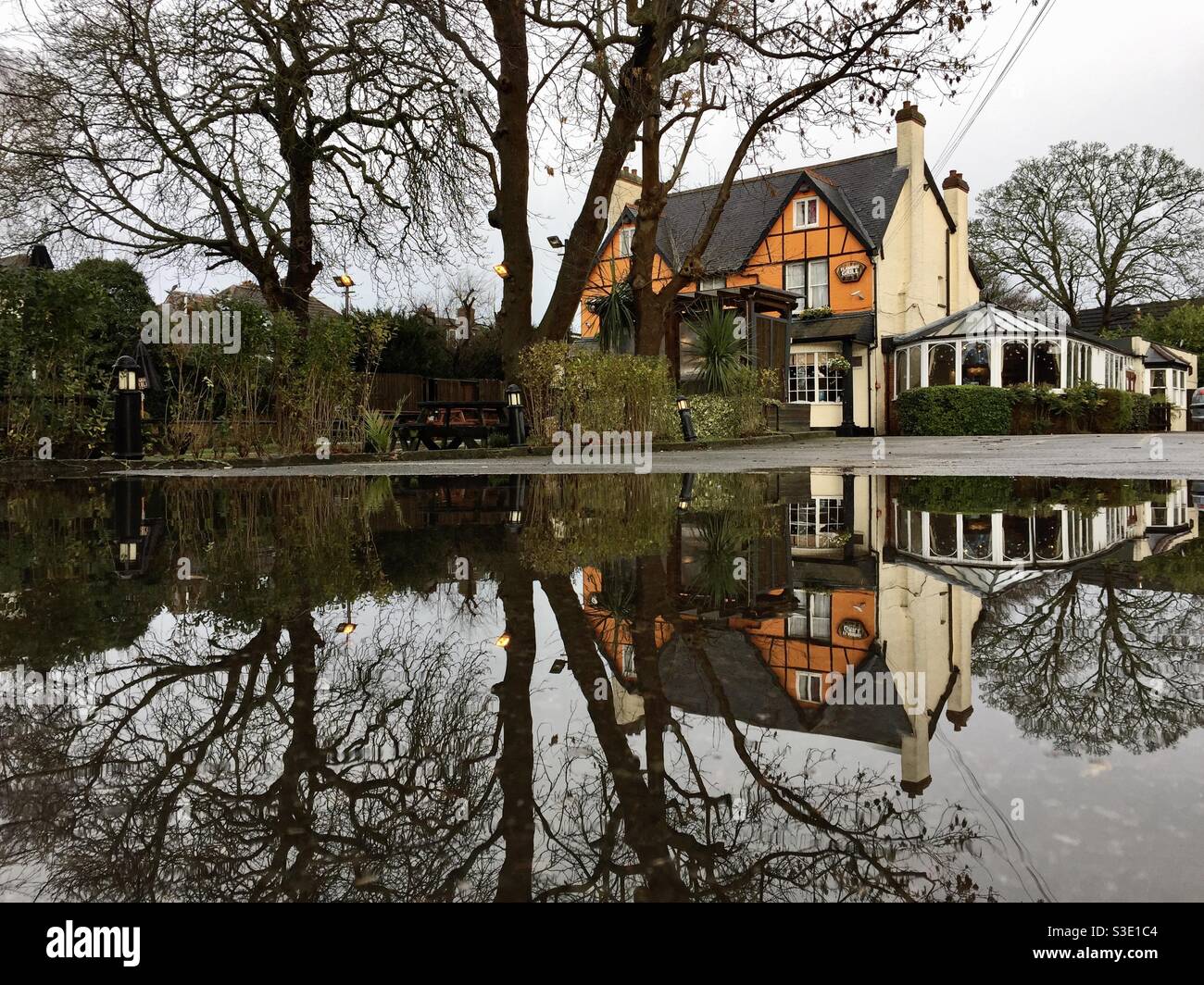 Pub reflected in water - Smartphone Captured Stock Image