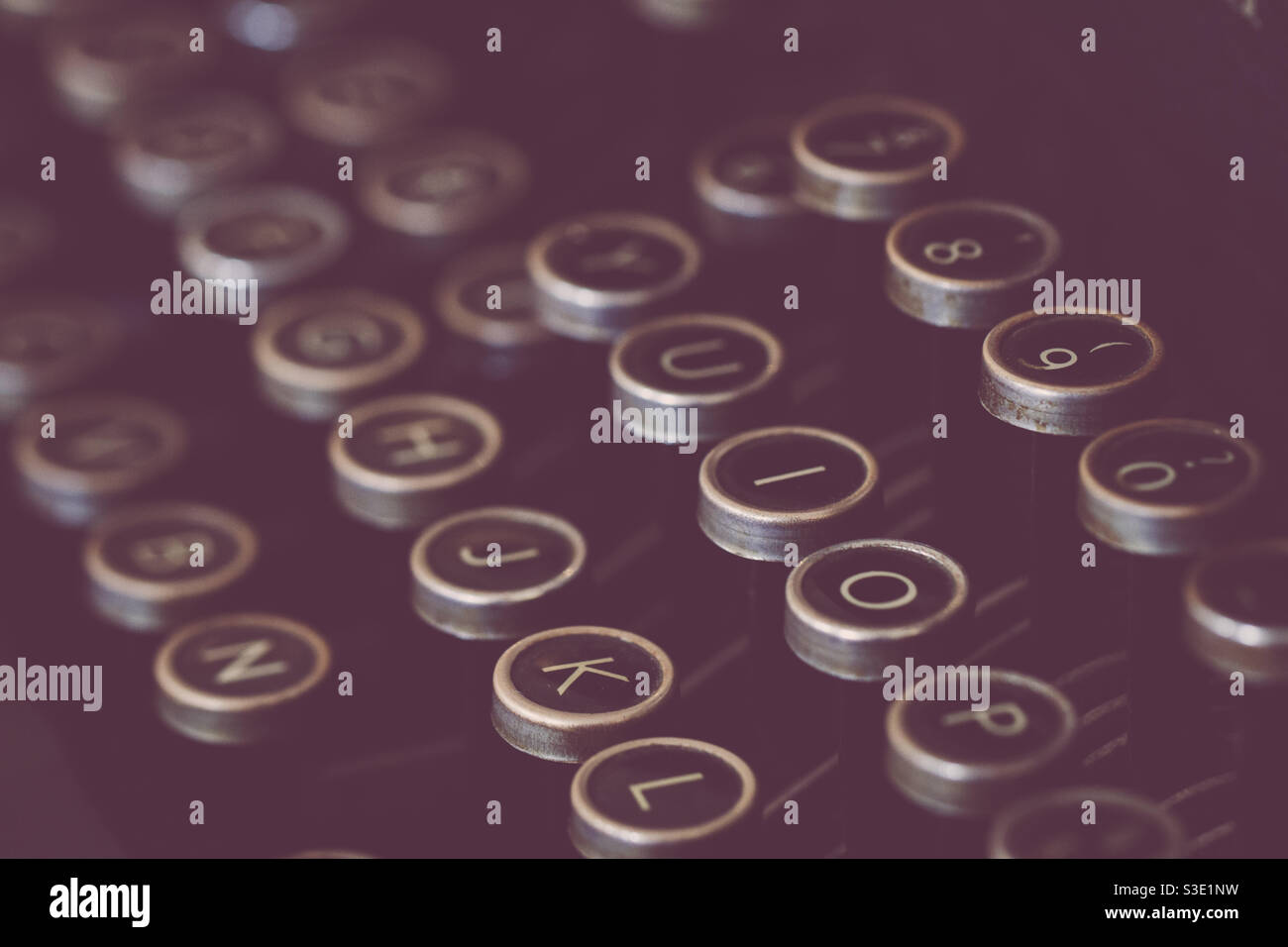 Close up of the round letter keys of an antique or old fashioned typewriter Stock Photo