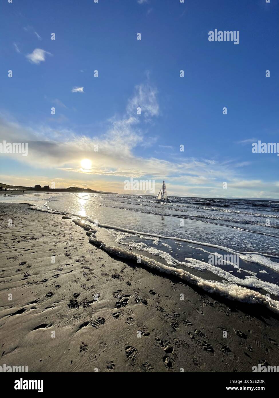 Sunny winter’s day view of sea ocean on Prestwick beach, Ayrshire