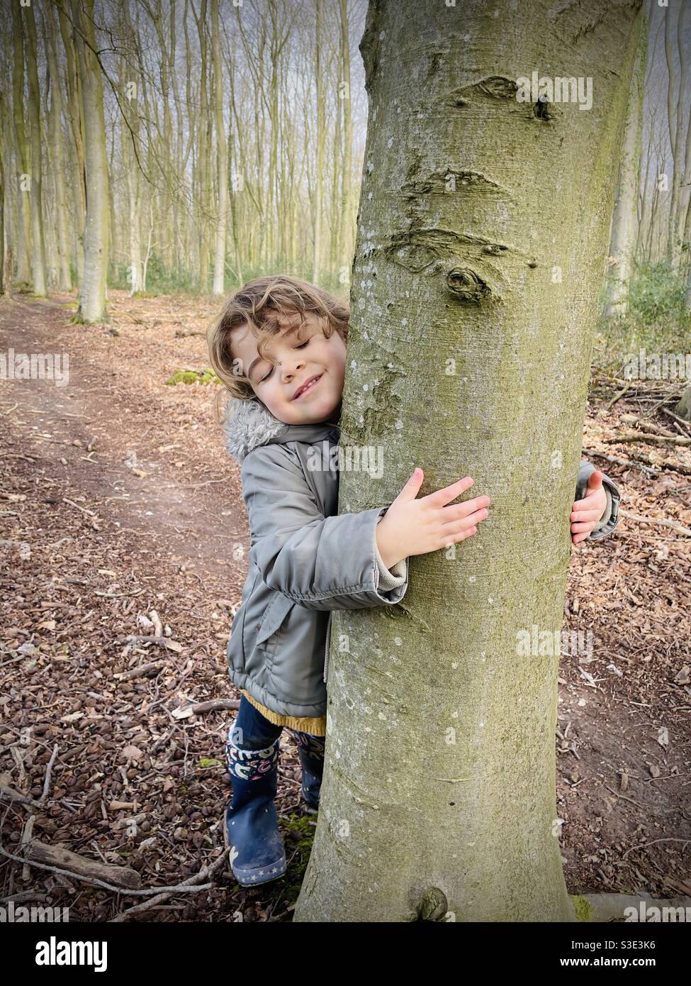 Little Tree Hugger Stock Photo