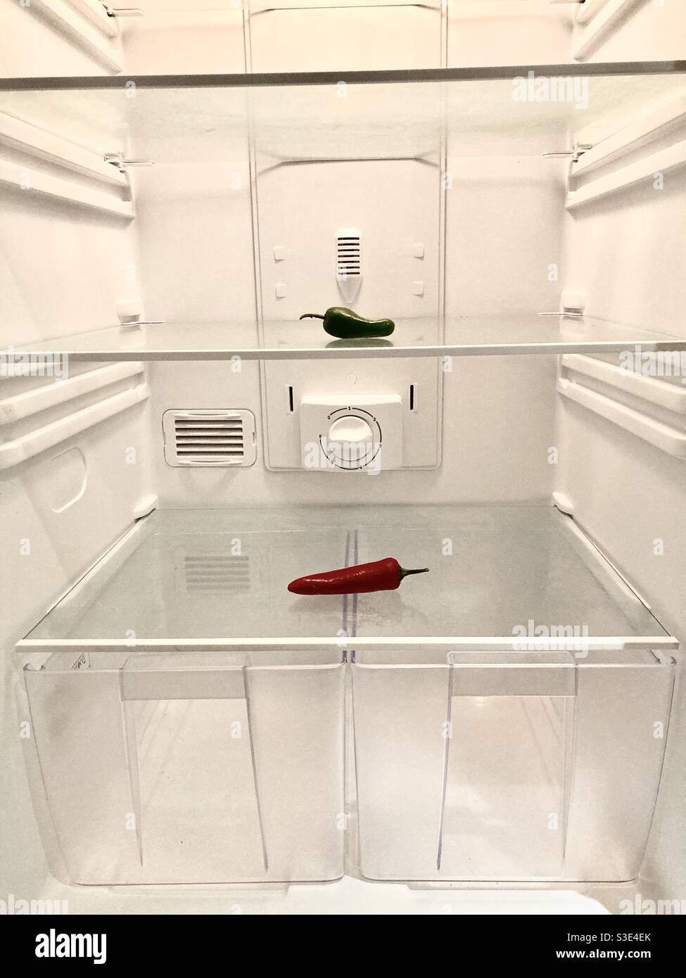 Chillis in the fridge Stock Photo