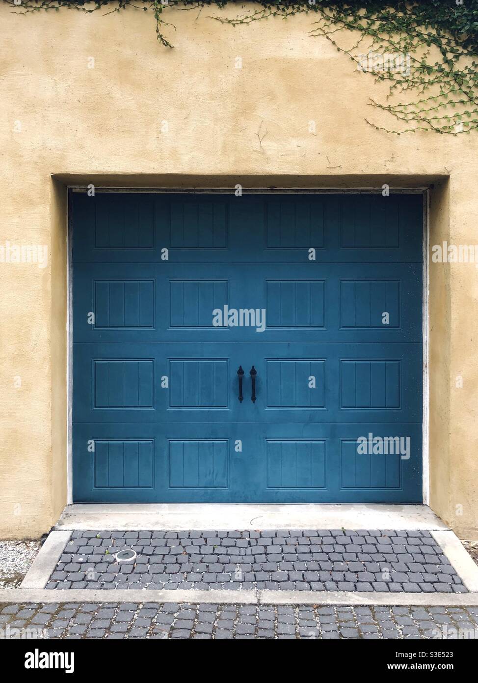 Blue garage door Stock Photo Alamy