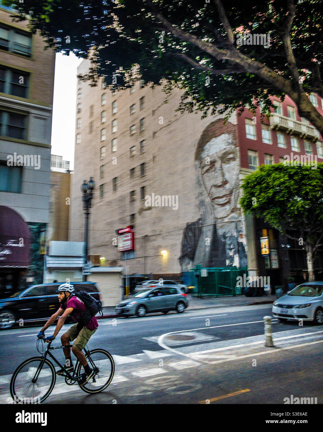 Bicyclist riding in downtown Los Angeles Stock Photo