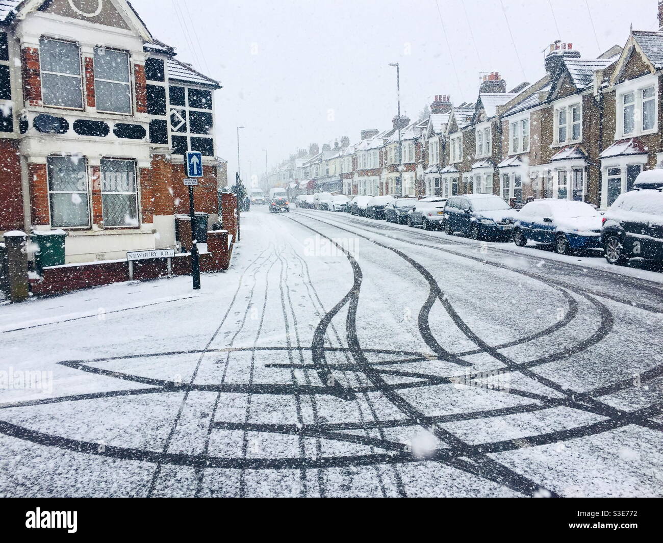 Pretty car tracks in snow - Smartphone Captured Stock Image