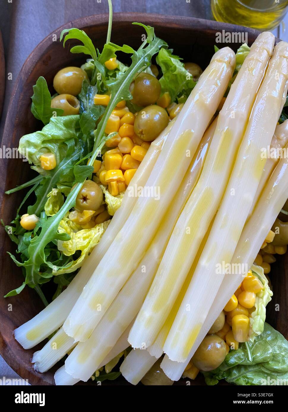 Asparagus salad in a wooden bowl Stock Photo