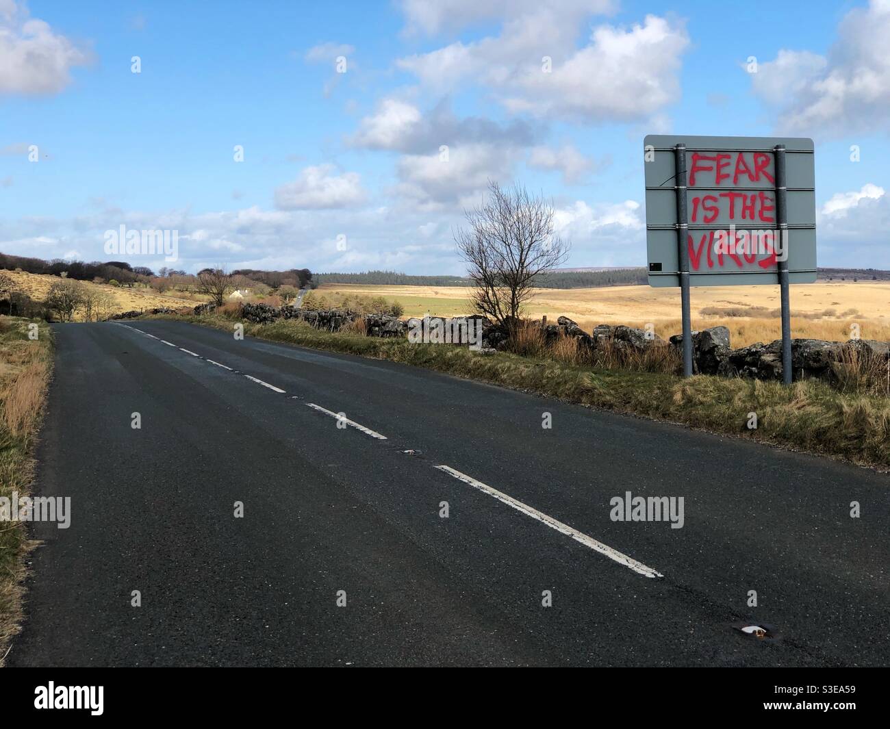 Anti lockdown coronavirus sceptic message on roadside. Dartmoor, Devon Uk 25th March 2021 - Smartphone Captured Stock Image