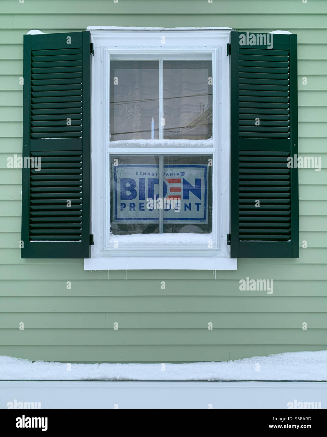 December, 2020, Biden for President sign in a window, Salem, Massachusetts, United States - Smartphone Captured Stock Image