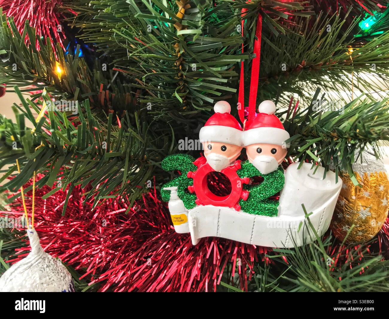 2020 Christmas tree ornament with virus, face masks, toilet roll and