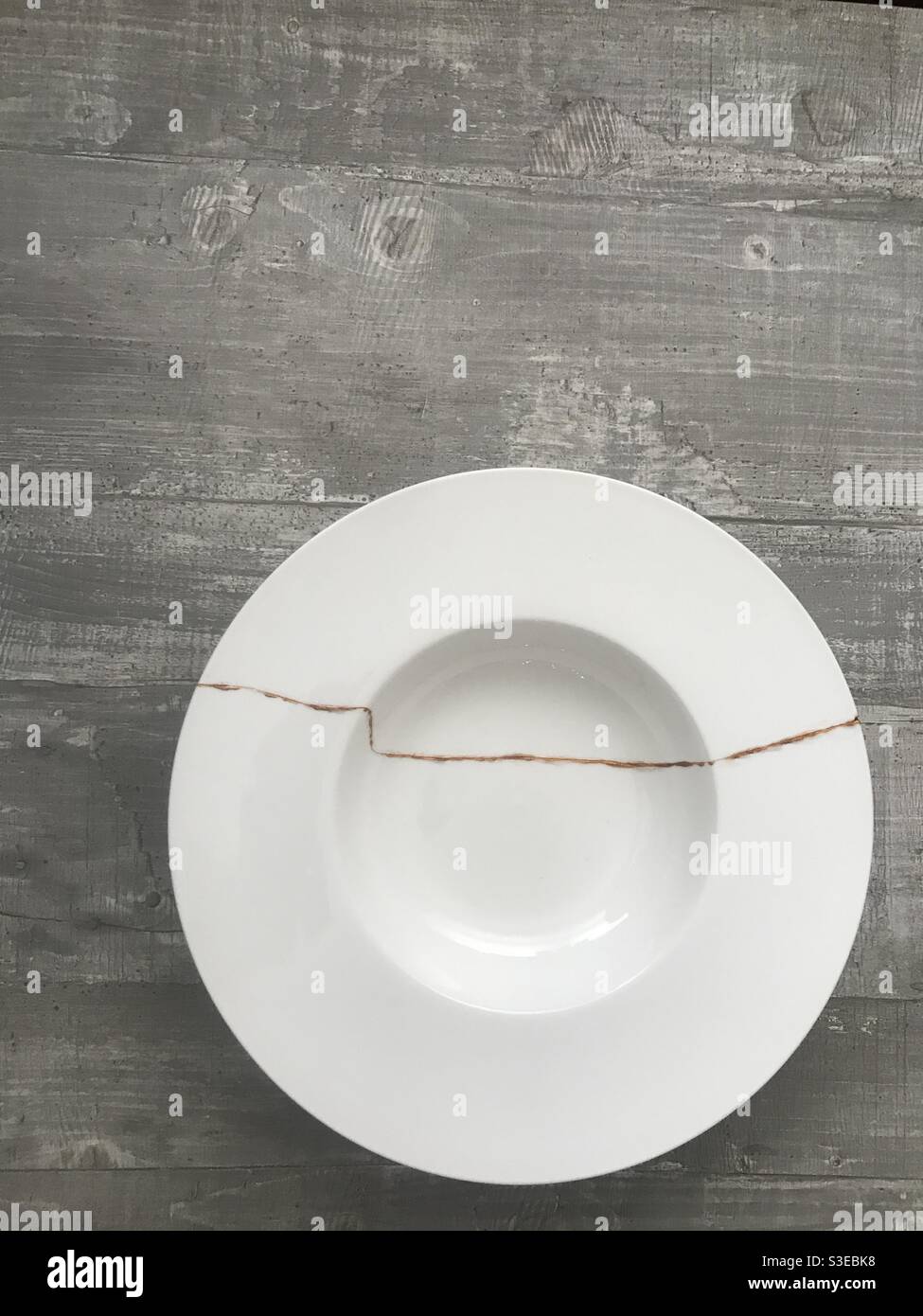 Antique Broken Japanese Beige Bowl Repaired With Gold Kintsugi Technique  Stock Photo - Download Image Now - iStock