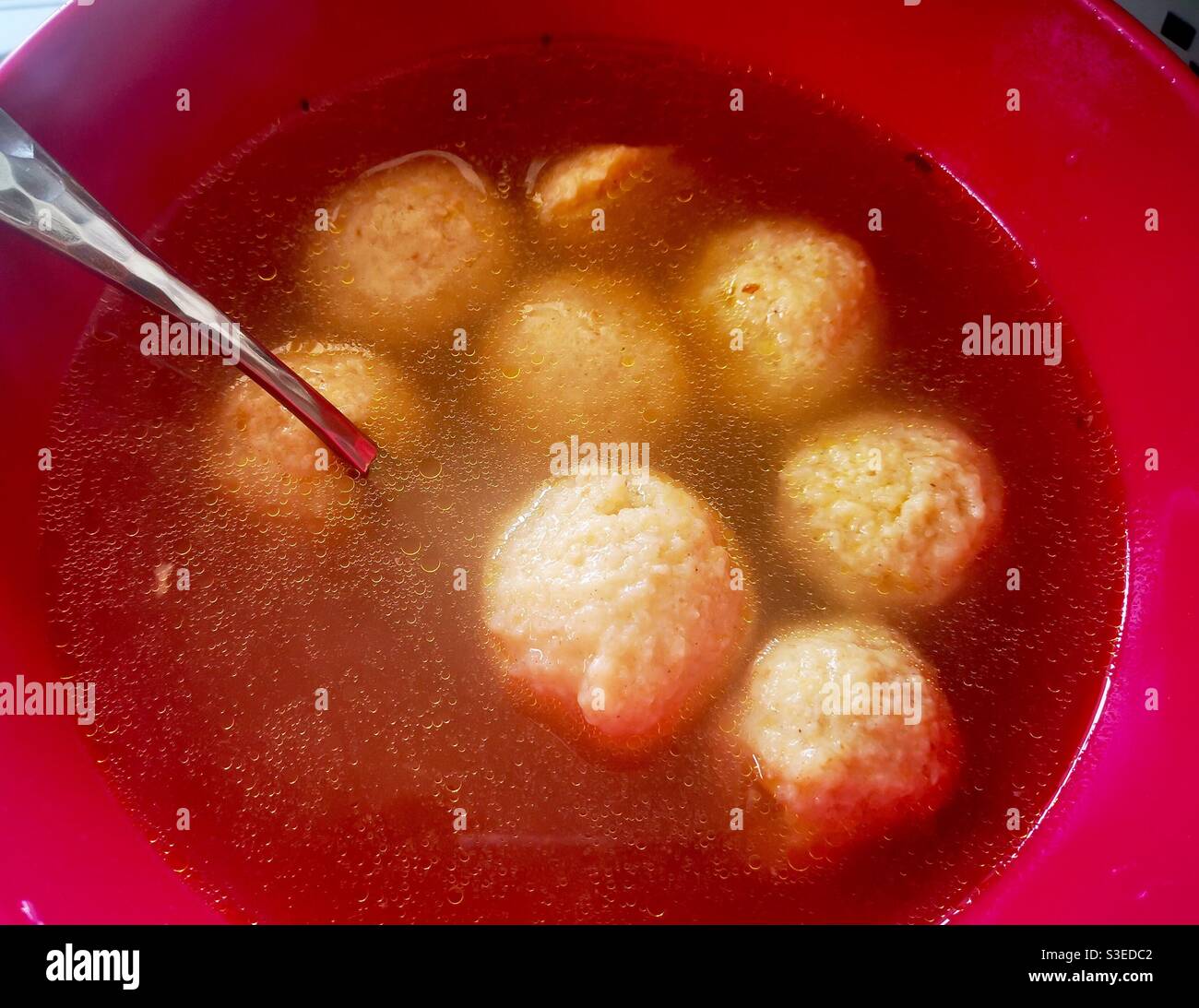 Matzo ball soup is a traditional dish eaten in the Jewish festival of passover. - Smartphone Captured Stock Image