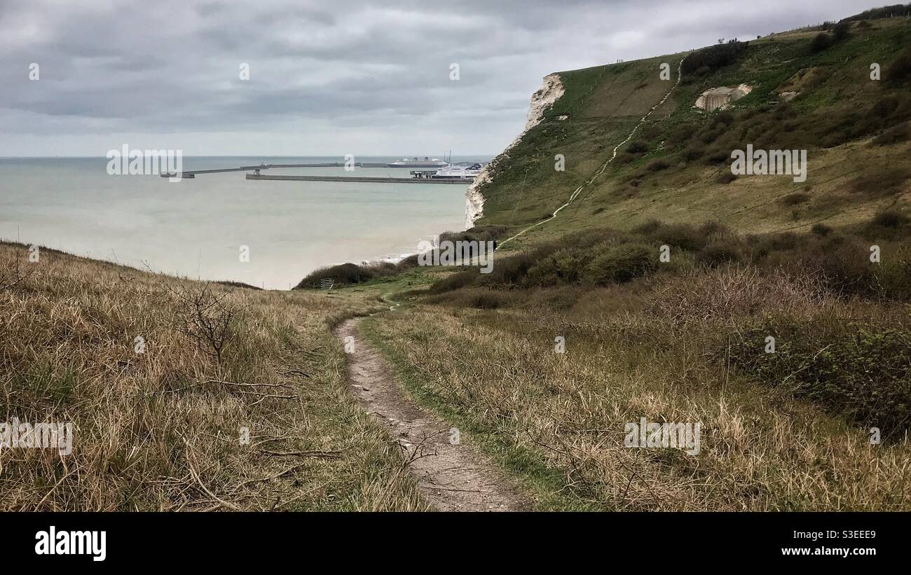 Looking across Dover Harbour from the grass bowl within the chalk cliffs above Fan Bay at Dover - Smartphone Captured Stock Image