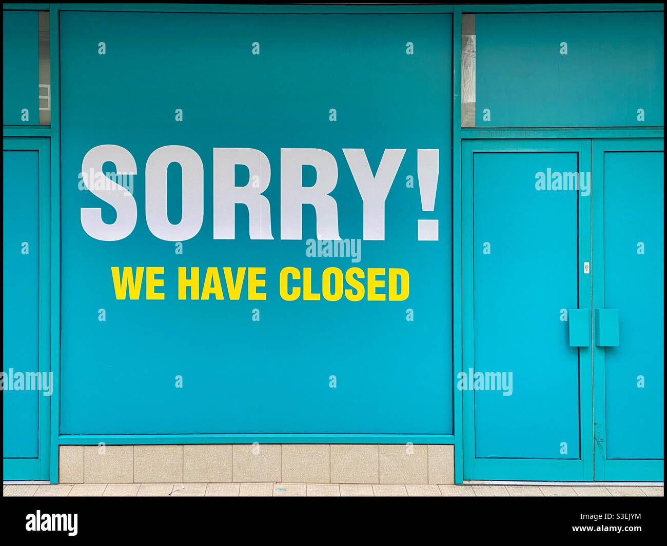 Sorry! We are closed. Another shop on the high street closes down - a victim of high rental prices, expensive business rates and the surge in online shopping. Photo Credit - ©️ COLIN HOSKINS. - Smartphone Captured Stock Image