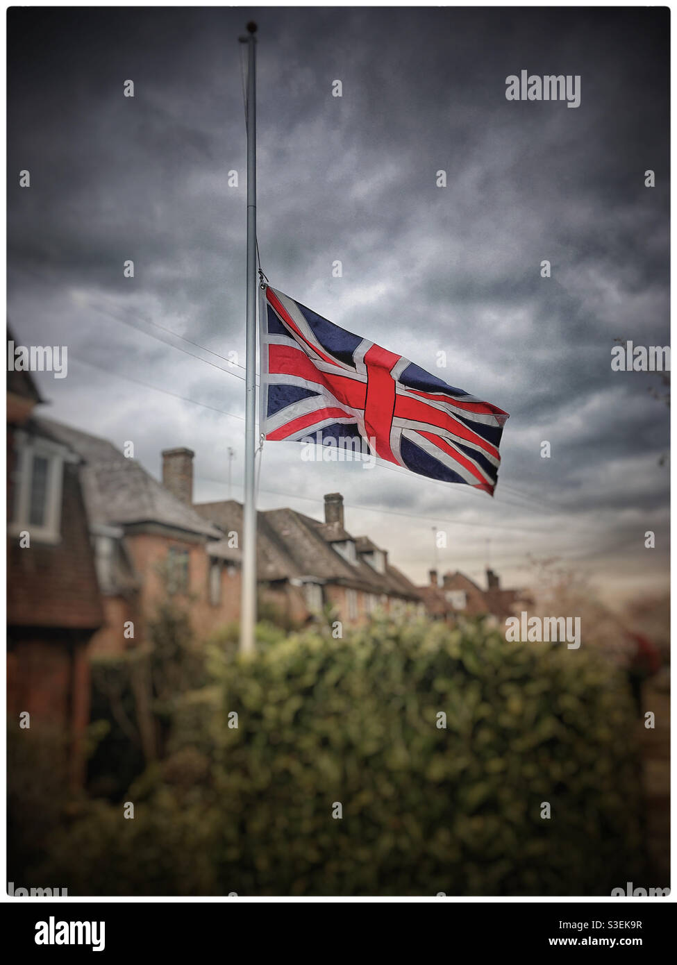 Union flag flying at half-mast to mark the death of His Royal Highness The Duke of Edinburgh, Prince Phillip. - Smartphone Captured Stock Image