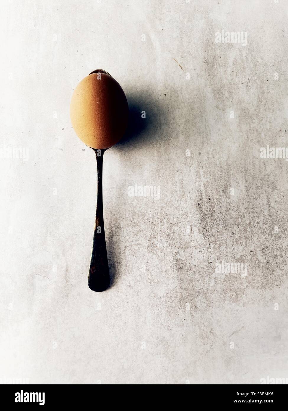 Egg and Spoon Stock Photo