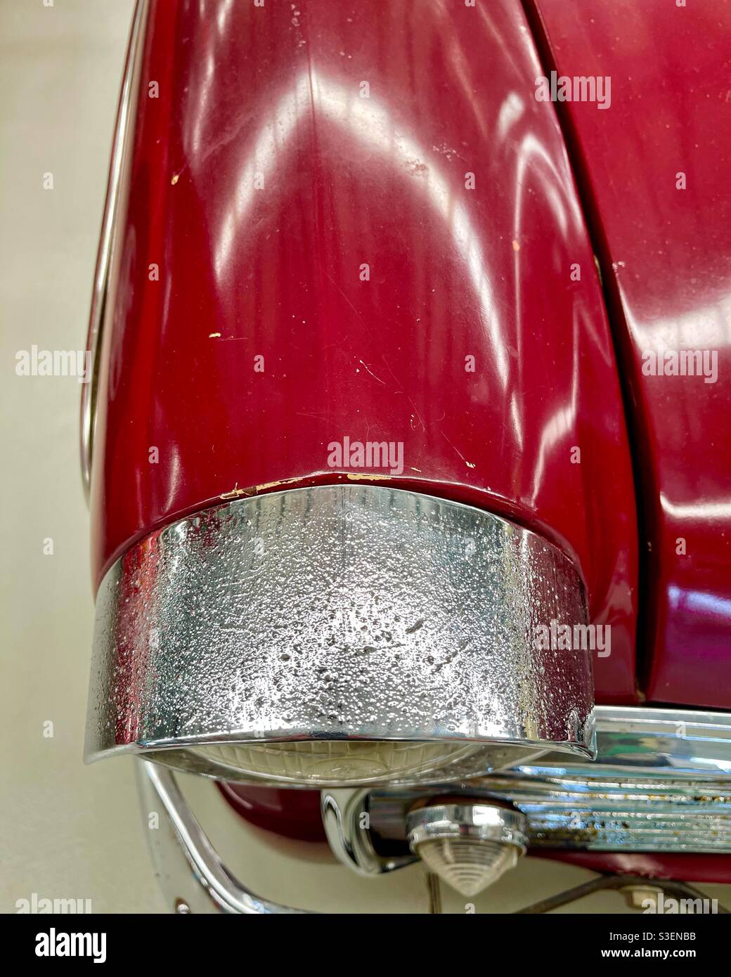 Close up top-down view of a retro car fender and headlight - Smartphone Captured Stock Image
