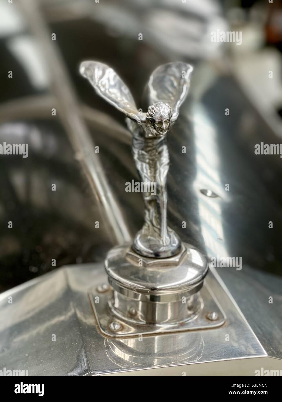 Close up portrait of the Flying Lady hood ornament on a vintage Rolls Royce at the National Transport Museum in Inverell, New South Wales, Australia Stock Photo