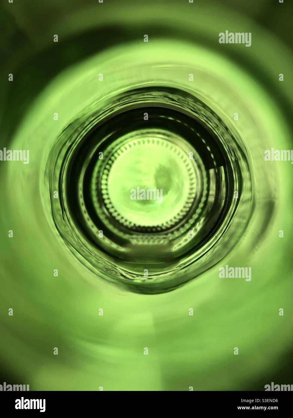 Abstract image of a green bottle photographed from it’s neck - Smartphone Captured Stock Image