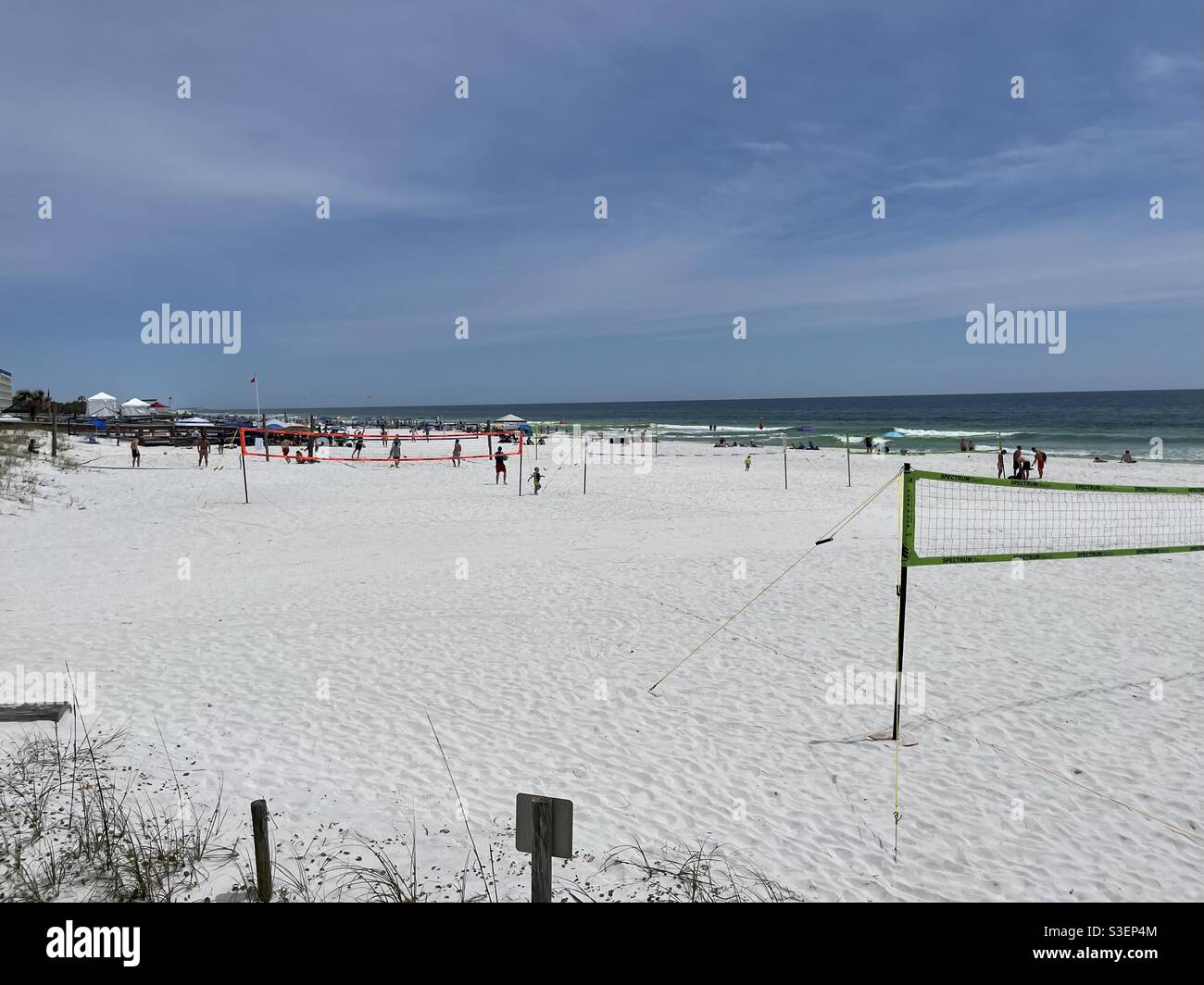 People playing volleyball on Florida white sand beach Stock Photo