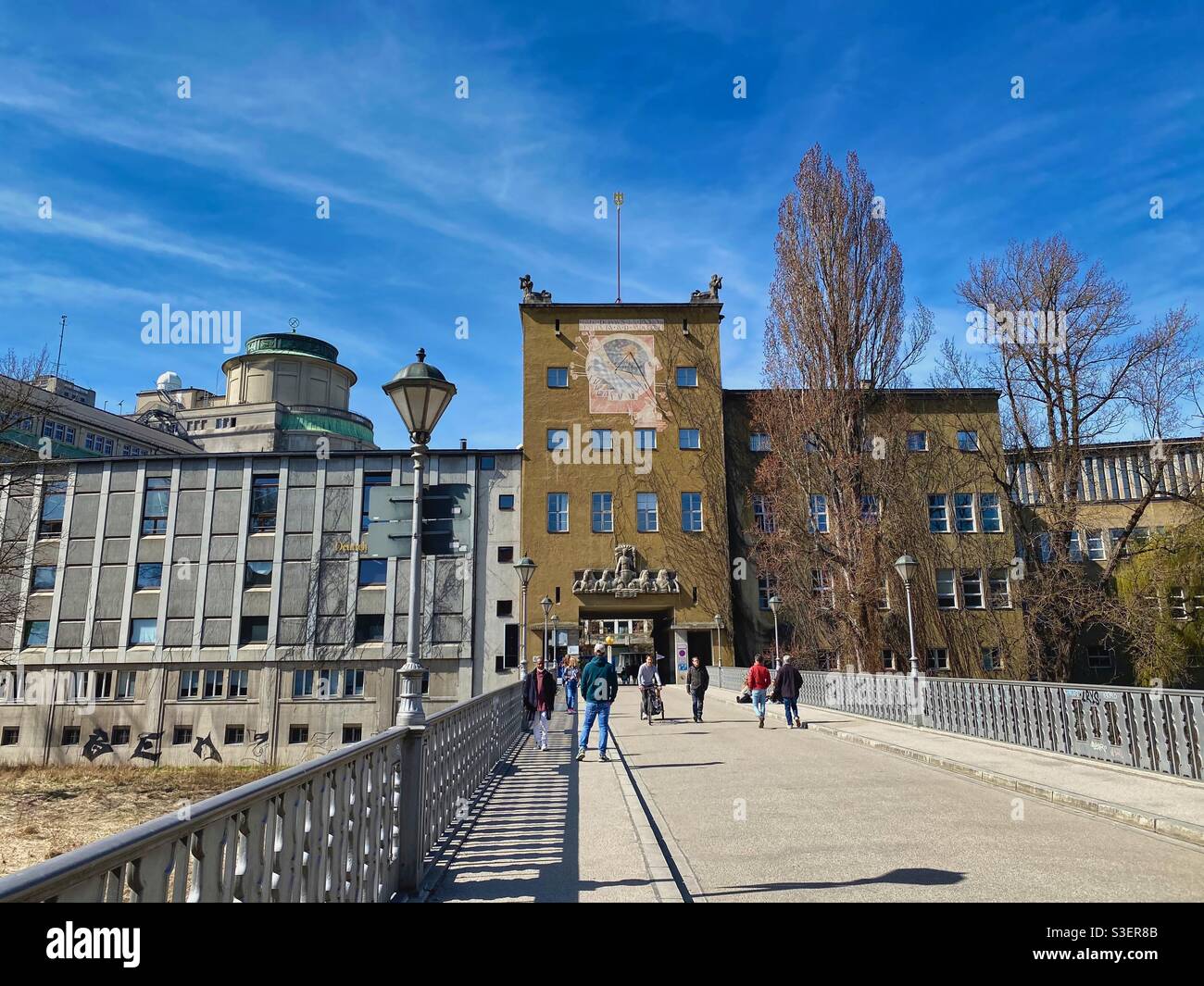 Bridge leading to Deutsches Museum over Isar river in Munich, Germany. - Smartphone Captured Stock Image