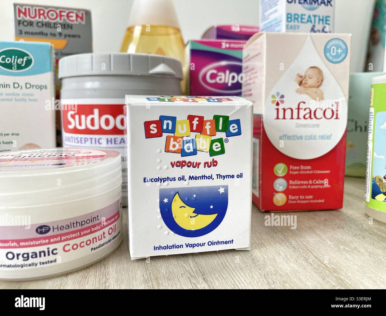 A collection of well know baby branded medicines and personal care products from the medicine cabinet Stock Photo