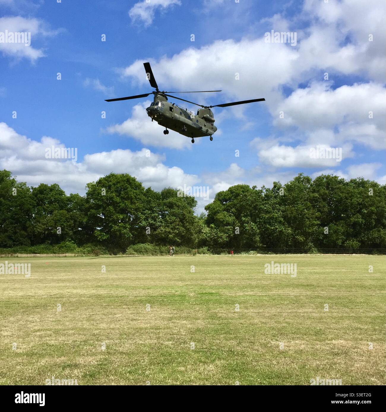 Chinook helicopter landing in a public field Stock Photo Alamy