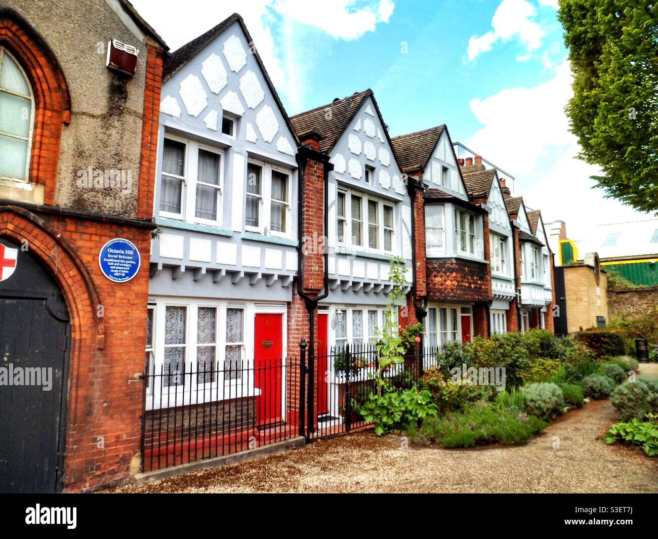 The Tudor style Redcross Cottages, Southwark, London. Designed by the philanthropist, Octavia Hill, in the 1880s as good quality social housing for the Victorian working classes. Stock Photo