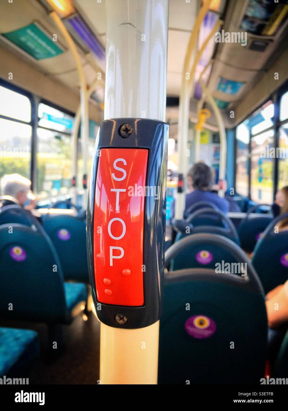 Stop button with braille inside bus - Smartphone Captured Stock Image