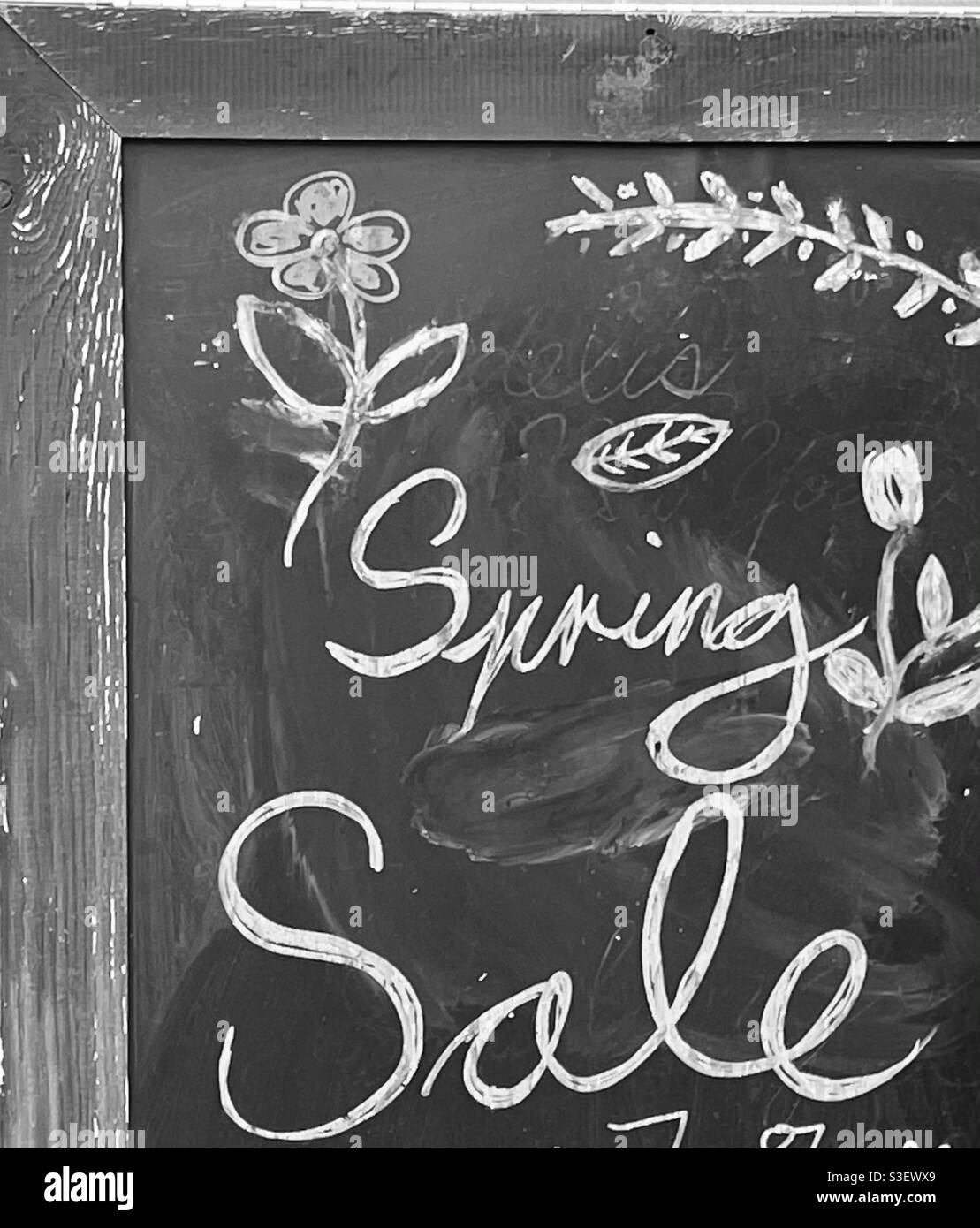 Spring sale chalkboard sign - Smartphone Captured Stock Image