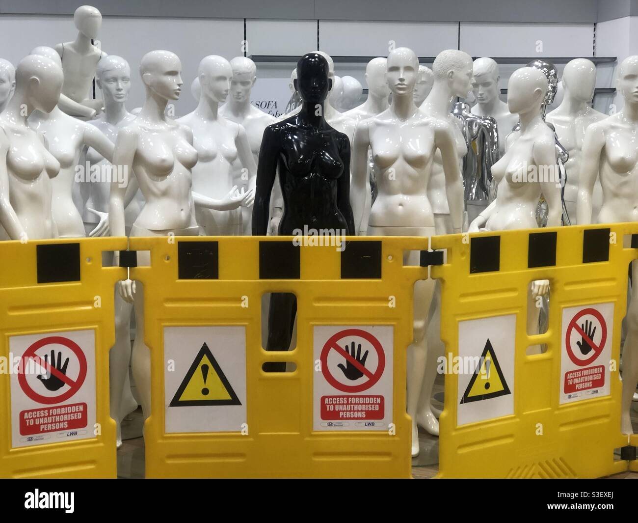 Mannequins stored in Debenhams store closure because of several years of falling sales and the covid pandemic - Smartphone Captured Stock Image
