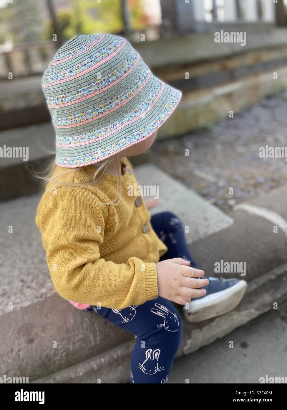 Toddler girl in hat Stock Photo