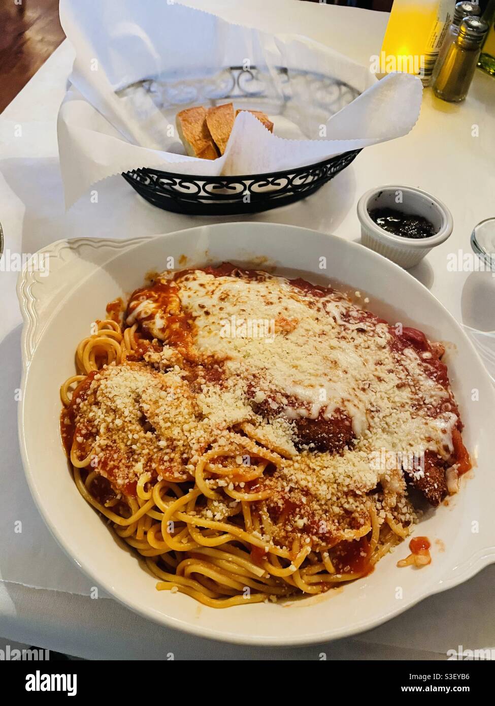 Chicken parmigiana with spaghetti And a lot of Parmesan cheese - Smartphone Captured Stock Image