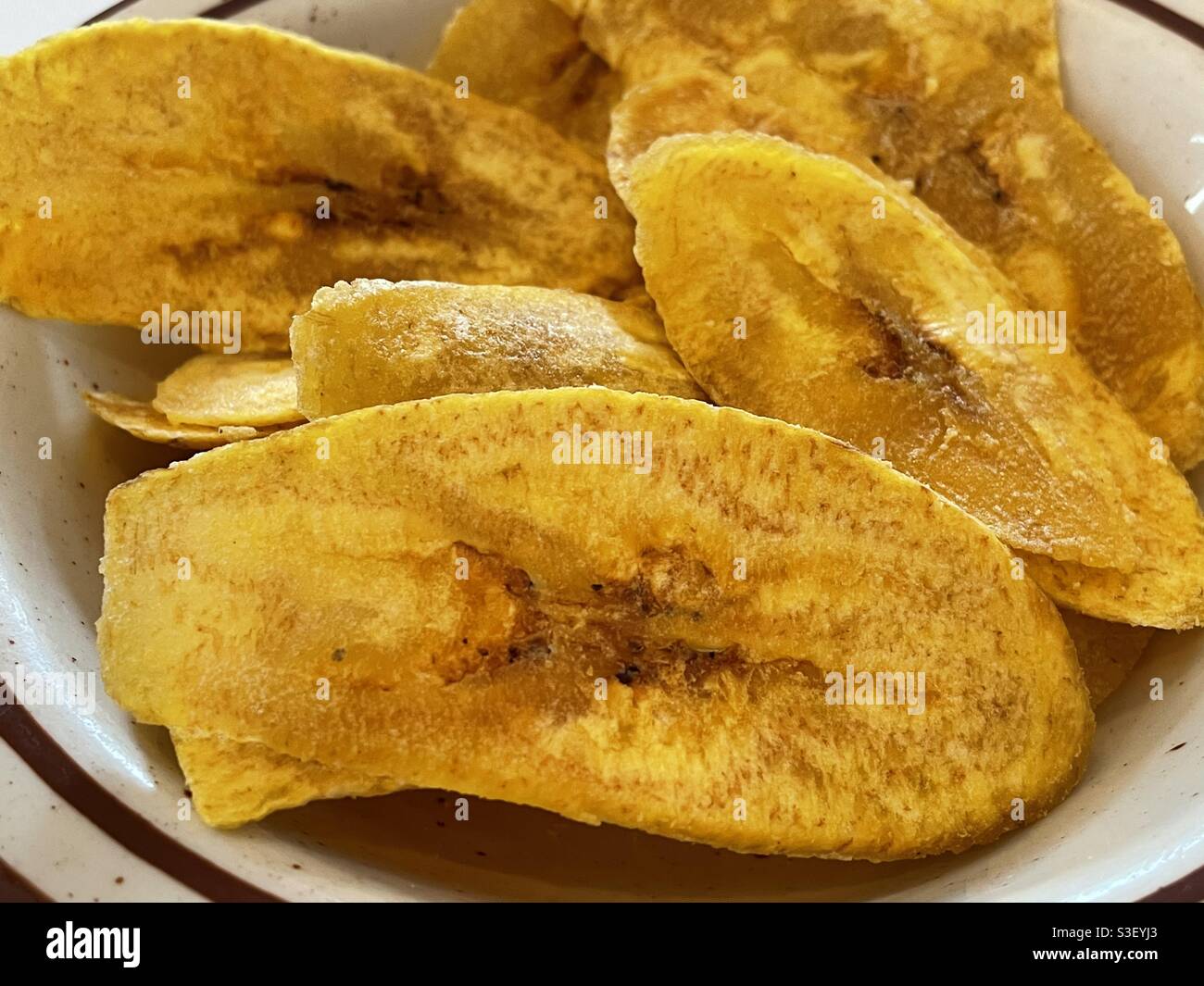 Green plantain chips Stock Photo Alamy