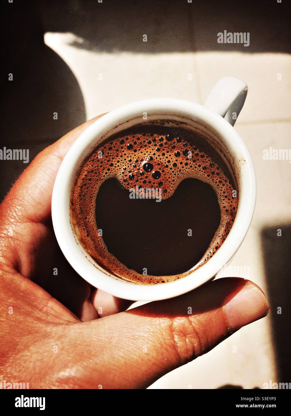 Morning coffee in the sun - Smartphone Captured Stock Image