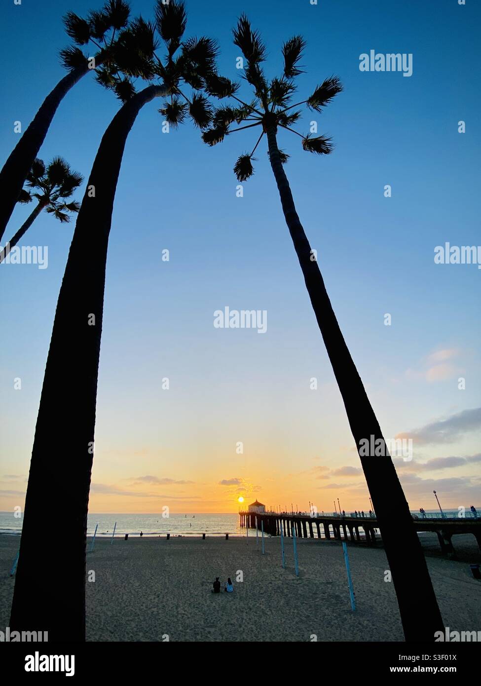The Manhattan Beach pier at sunset. Manhattan Beach, California USA. Stock Photo