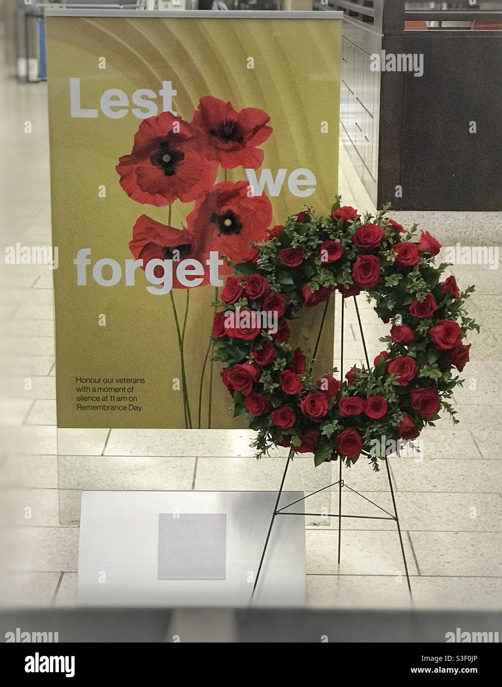 Remembrance Day wreath and tribute, in downtown Calgary, Alberta, Canada. - Smartphone Captured Stock Image