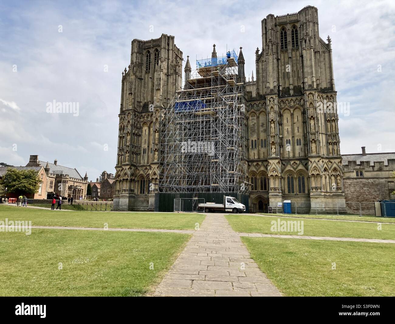 Scaffolding erected at the front of Wells Cathedral, Wells, Somerset, England, UK, Europe undergoing restoration and repair works to the historic monument Stock Photo