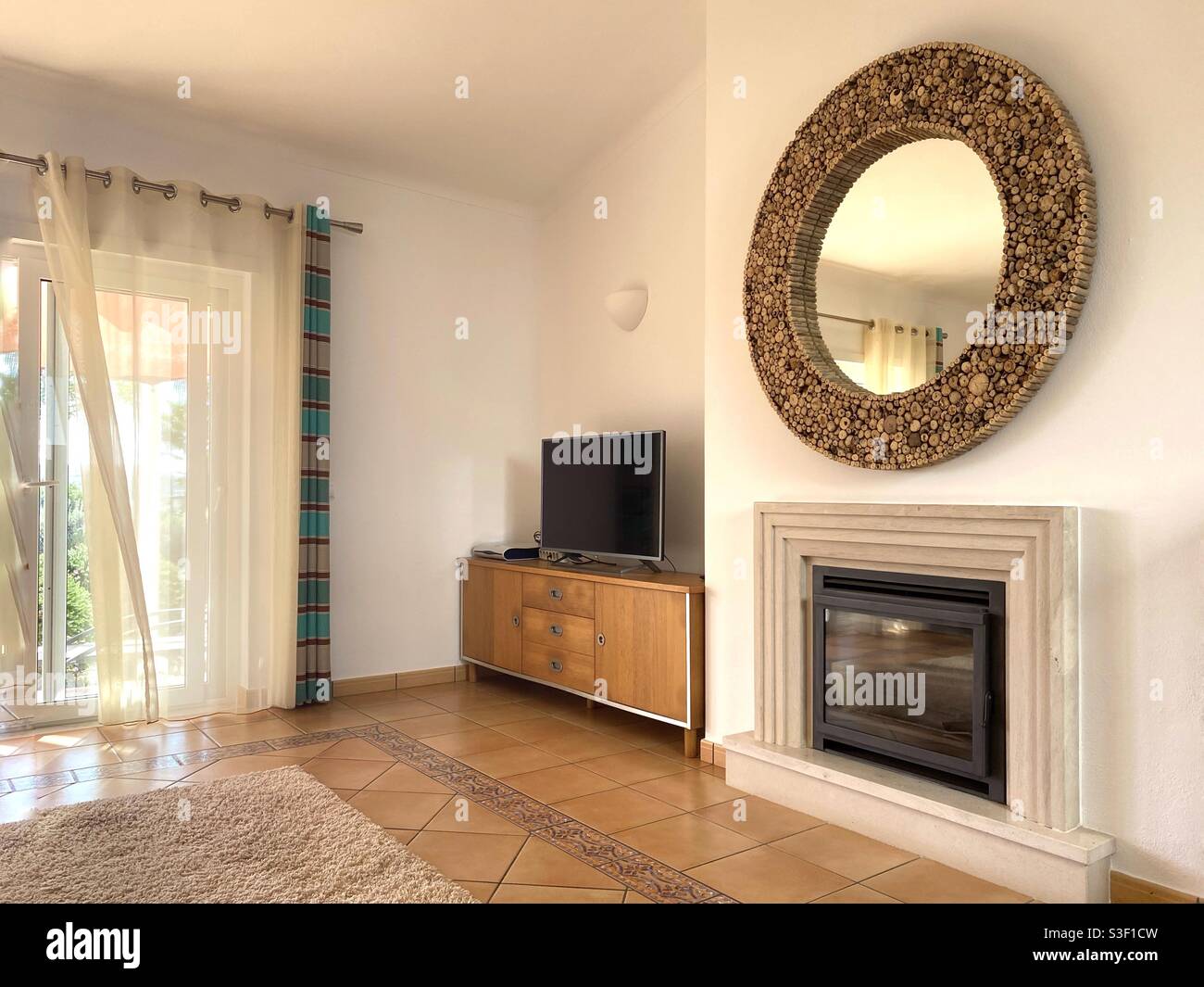 Living room with insert fireplace - Smartphone Captured Stock Image