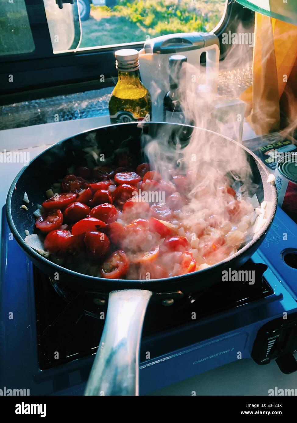 Cooking in a camper van - Smartphone Captured Stock Image