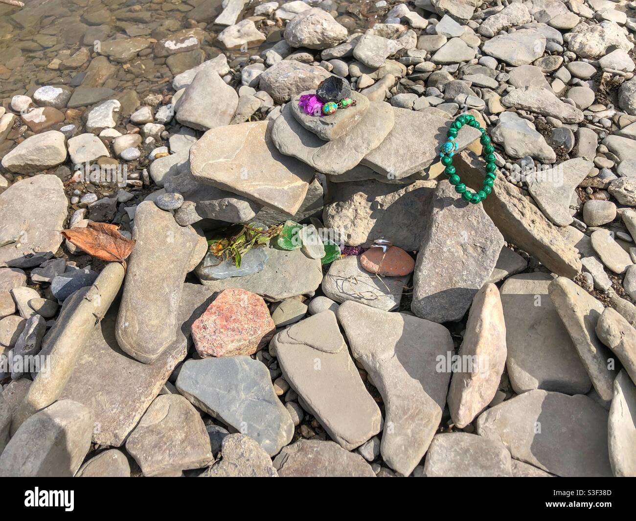 A stone altar on a riverbed. Stock Photo