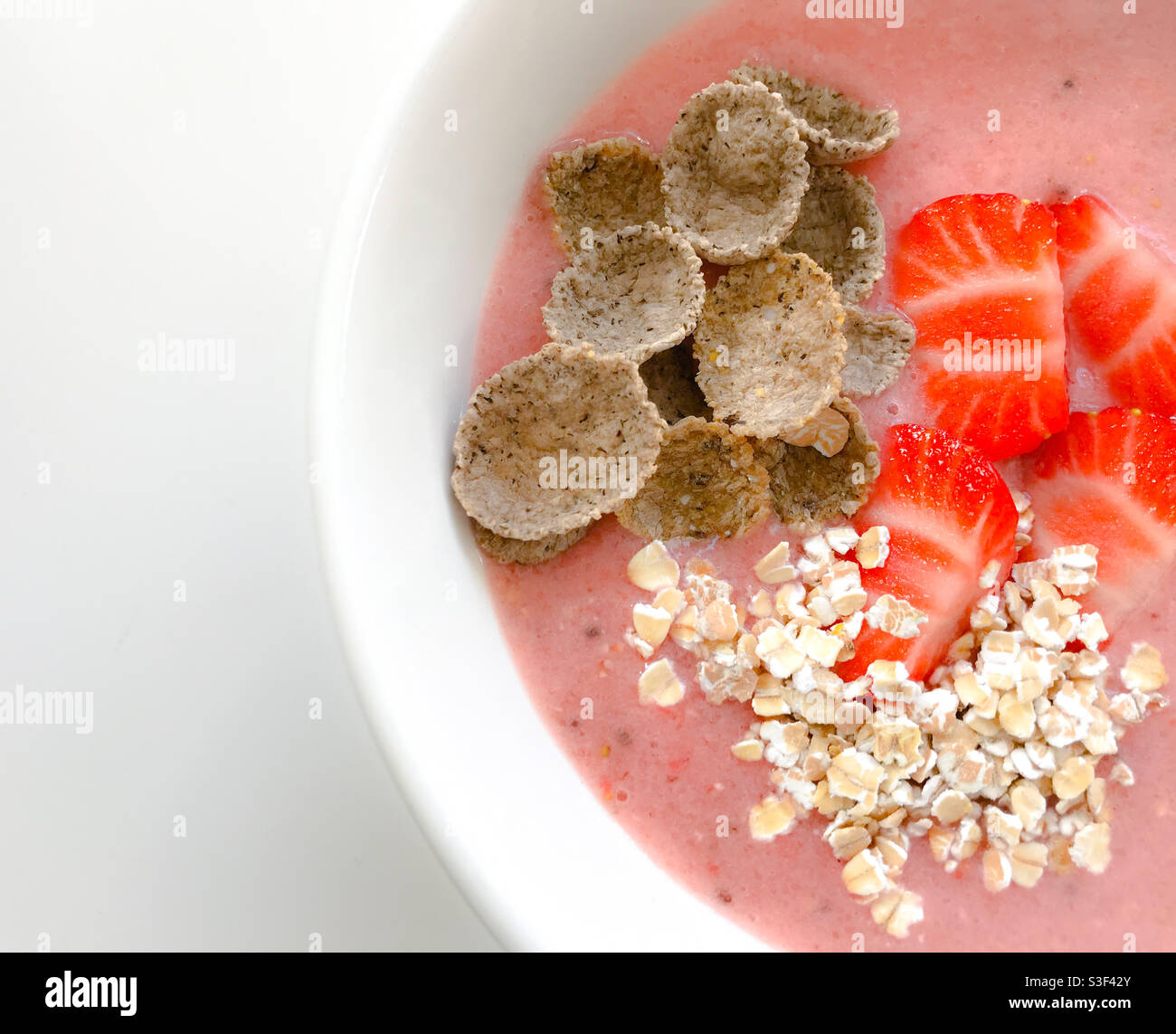 Food - Breakfast- strawberries smoothie with oatmeal and spelt flakes Stock Photo