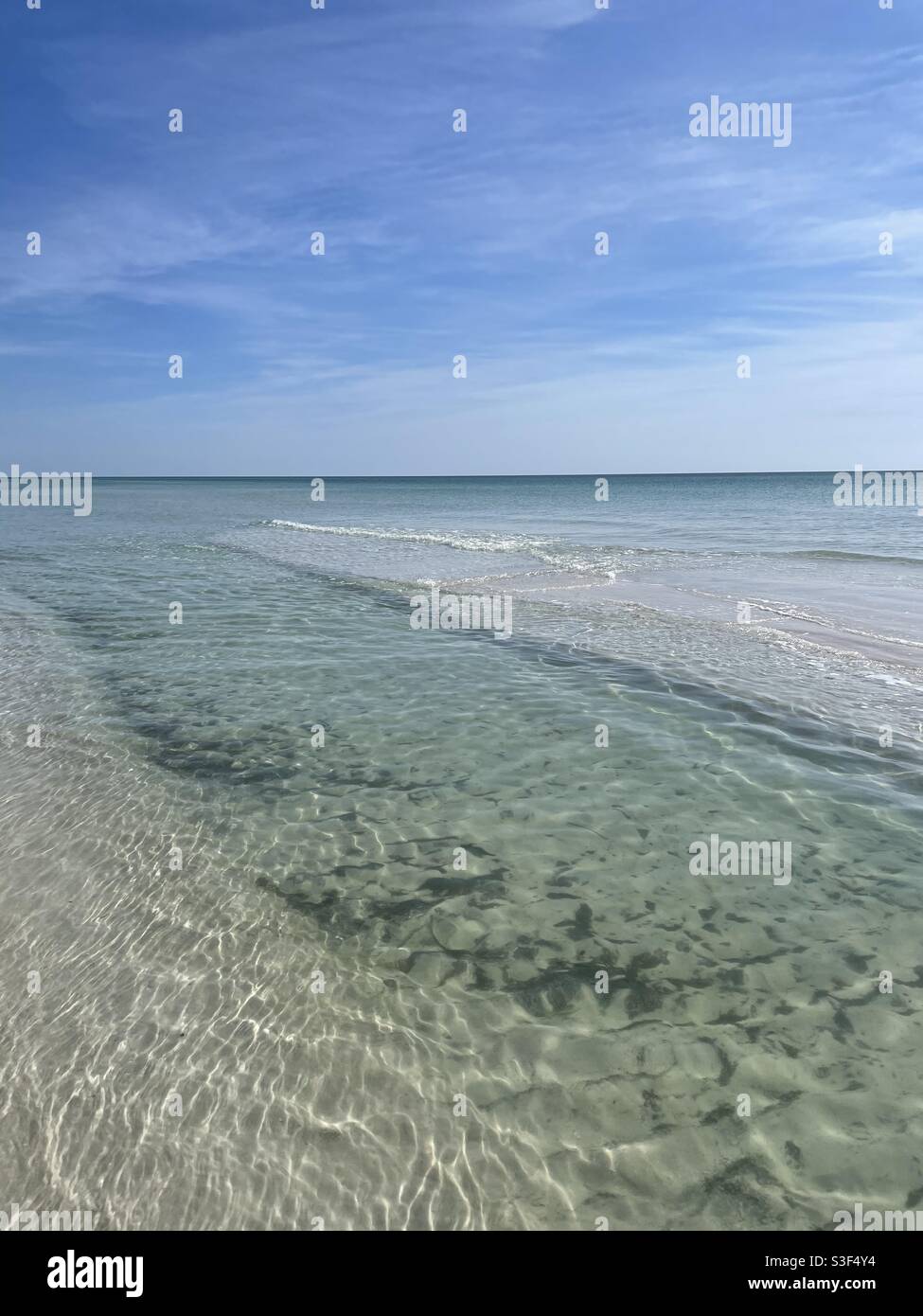 Seascape with a large sandbar on the emerald colored water of the Gulf of Mexico Florida - Smartphone Captured Stock Image