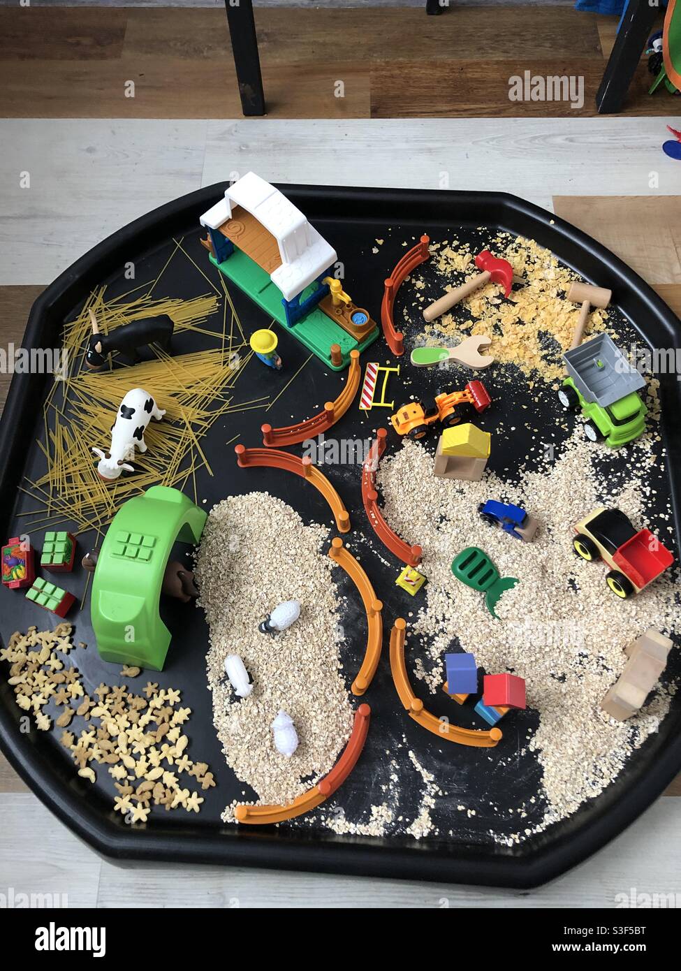 Sensory play tray Stock Photo Alamy