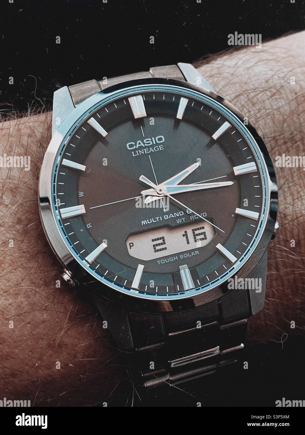 Casio Waveceptor Lineage classic anadigi digital analog solar atomic  titanium wrist watch on a black background Stock Photo - Alamy