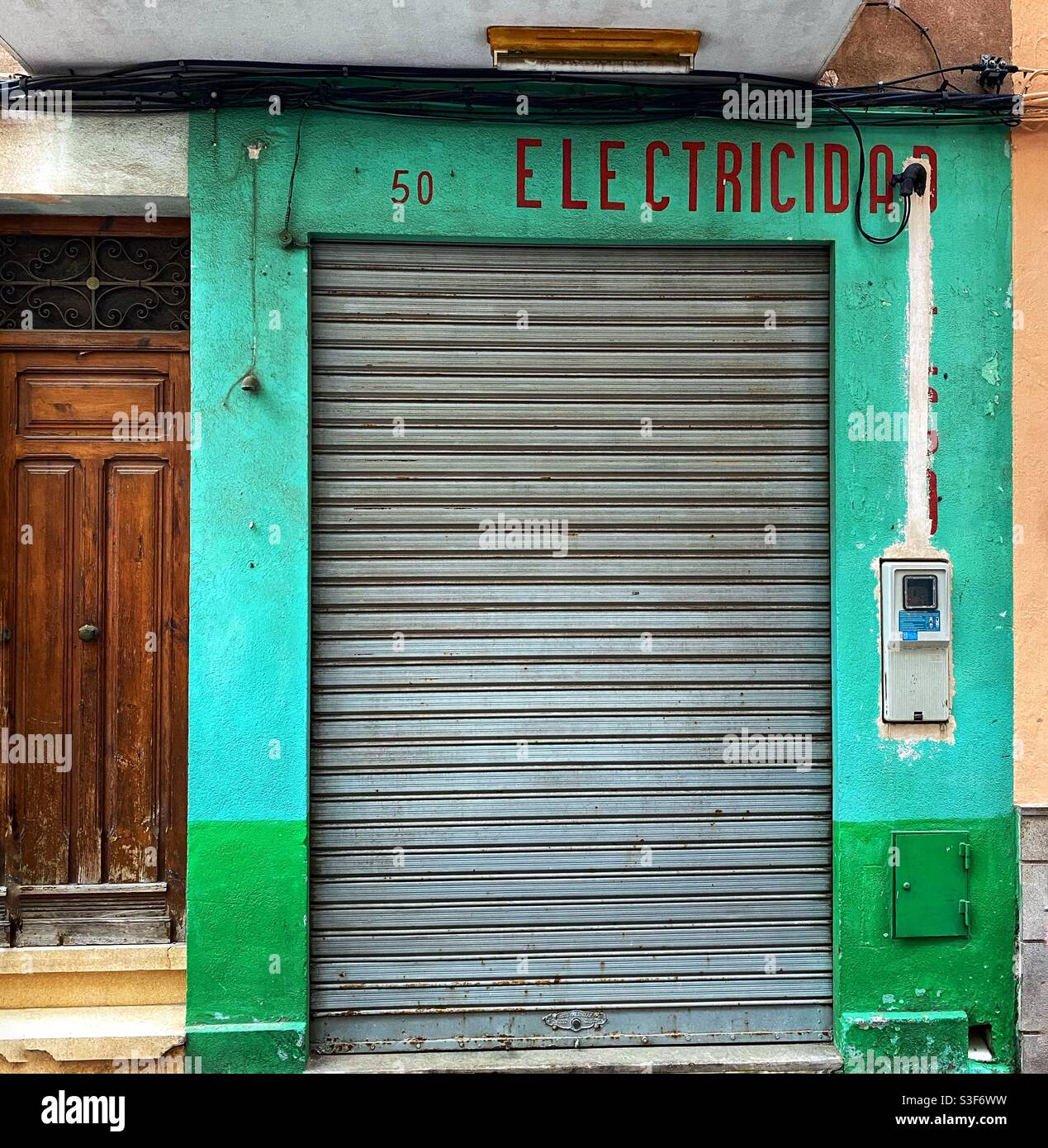 The front of an Old electricity shop in a village Stock Photo
