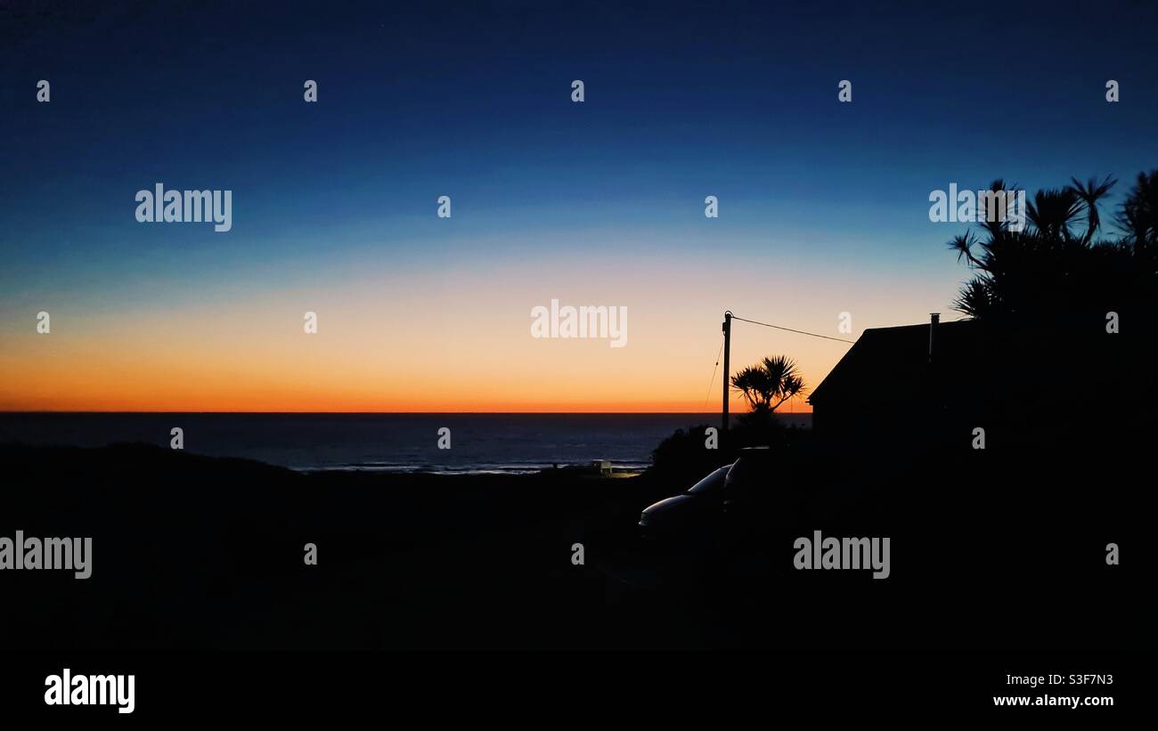 Sunset over a beach in Cornwall - Smartphone Captured Stock Image