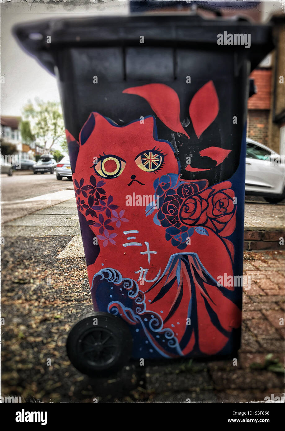 Cat painted on bin in a Japanese art style - Smartphone Captured Stock Image