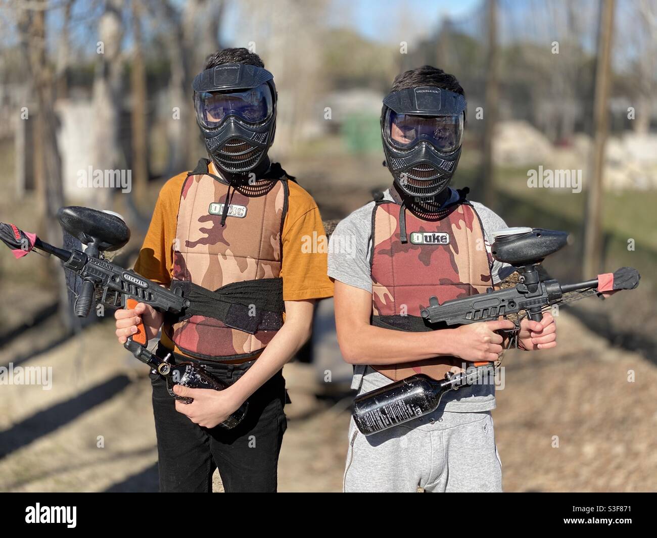 Two boys posing with their paintball gear in Palavas les Flots, near Canon plage and Montpellier, Occitanie, south of France Stock Photo