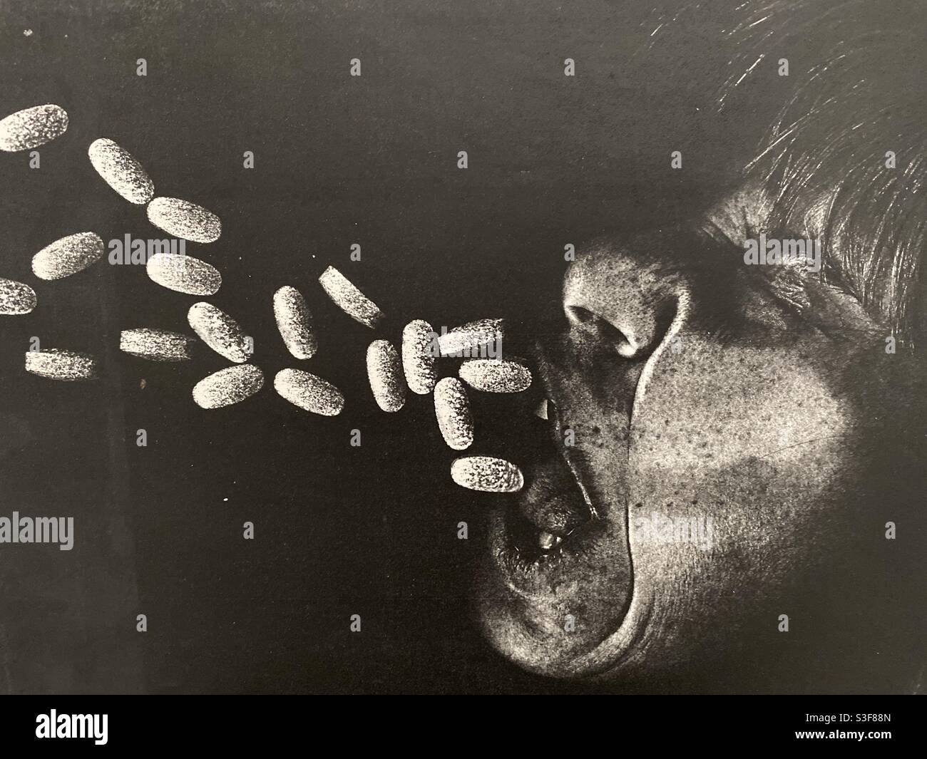 Vintage black and white abstract copy machine art piece: “Vomiting Vitamins” Stock Photo
