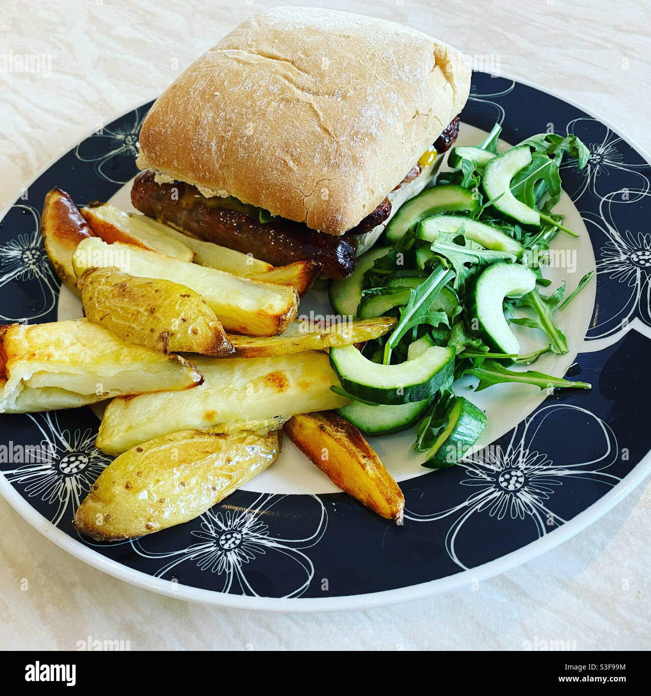 American Sausage Sarnie & Pickled Cucumber Relish. 11 May 2021. - Smartphone Captured Stock Image