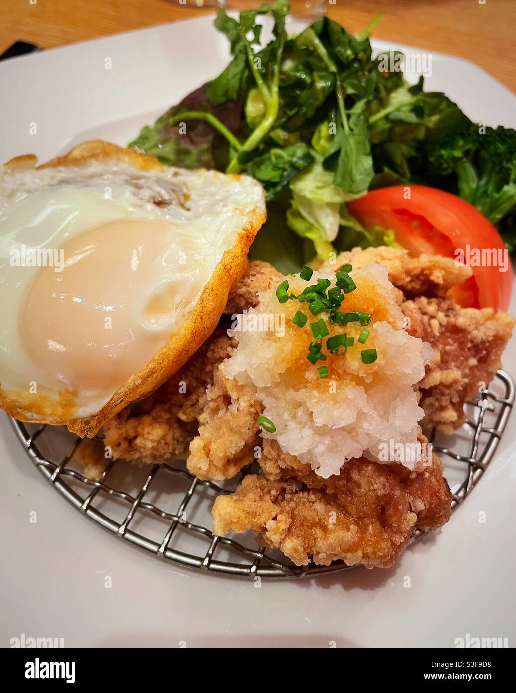 A fried chicken luncheon meal at a Japanese restaurant in Greenwich Village, NYC, USA - Smartphone Captured Stock Image